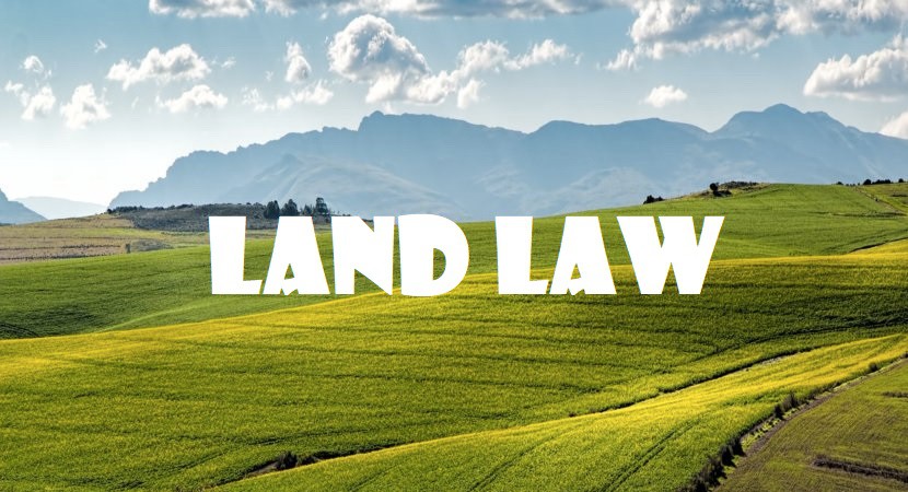 What type of land is urban residential land according to the Land Law? How is residential land use tax calculated in urban areas?